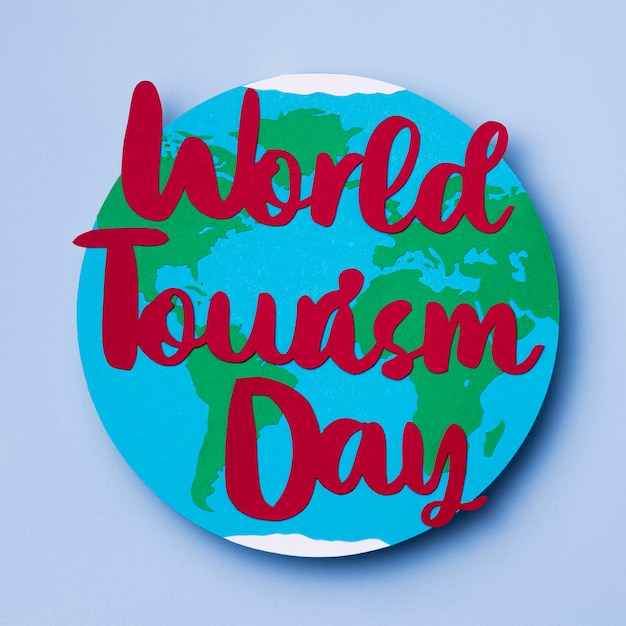 Top view world tourism day with lettering