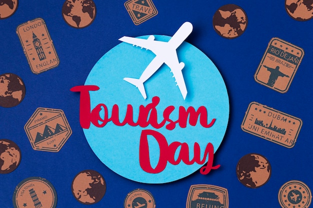 Free photo top view world tourism day with lettering