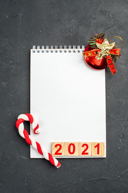 Free Photo top view writing 2021 number in blank notepad