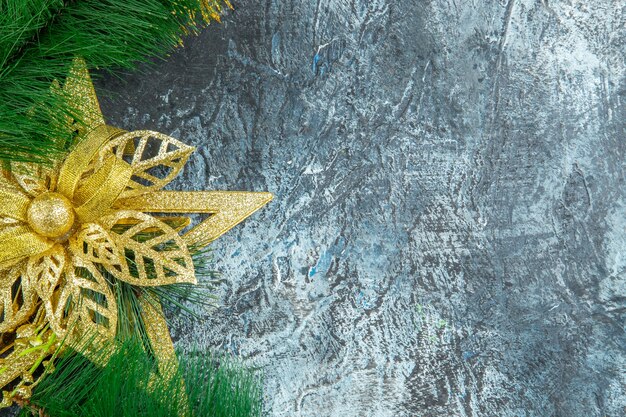 Top view xmas tree toy on grey background with free space xmas photo