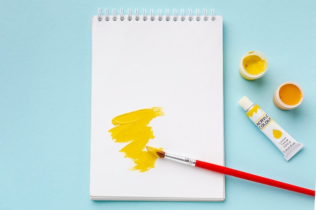 Top view of yellow aquarelle with copy-space