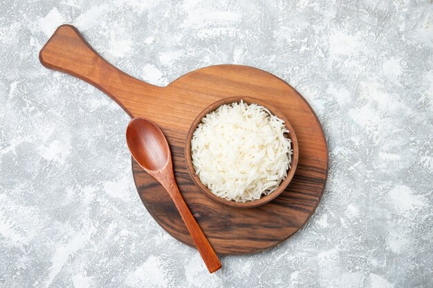 Top view yummy cooked rice inside plate on a white