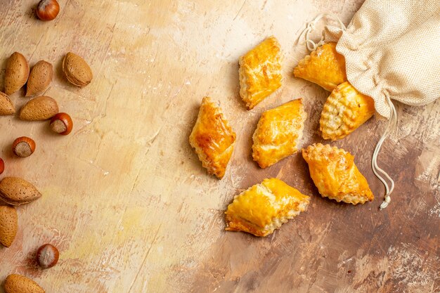 Top view of yummy nut pastries sweet cakes