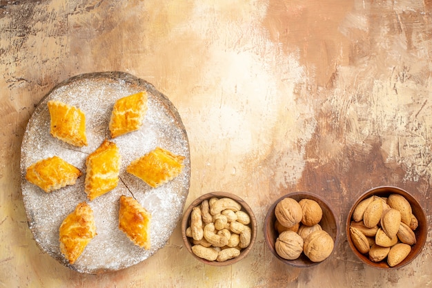 Top view of yummy nut pastries sweet cakes