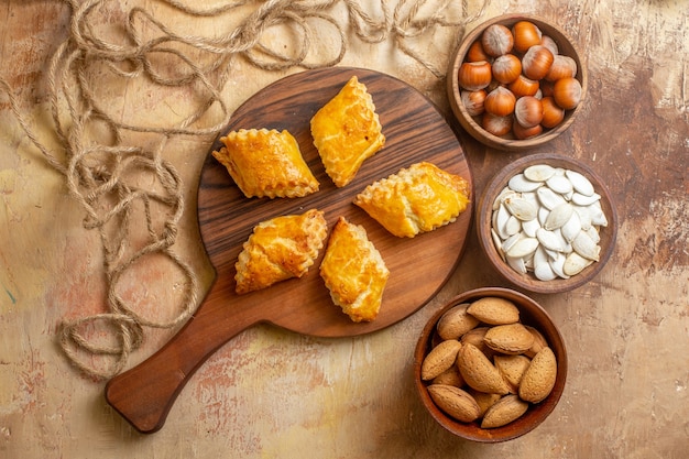 Top view of yummy nut pastries with seeds and nuts