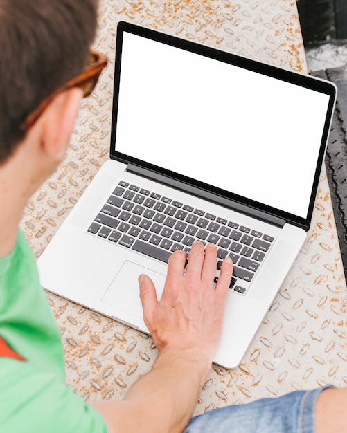 Free photo topview man working on laptop mockup