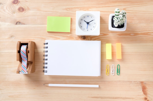 Free photo topview of office stuff on wooden working table.