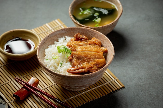 Toriyaki chicken on dark surface