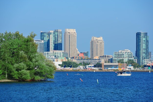 Toronto skyline with boat urban architecture and blue sky