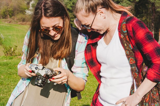 Tourist girls with camera