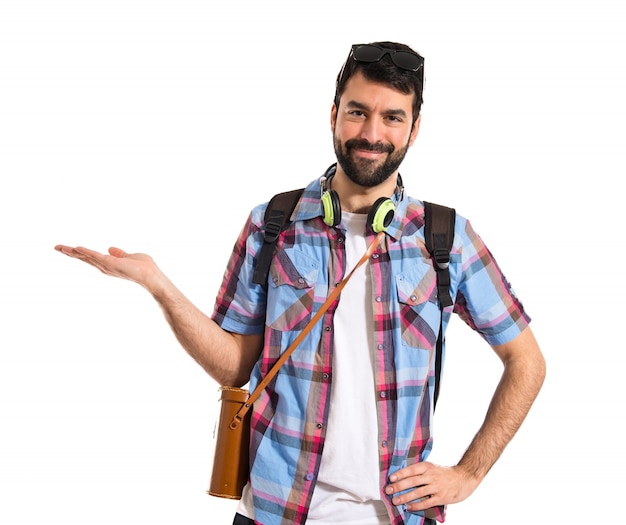 Tourist holding something