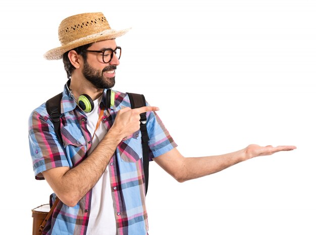 Tourist holding something