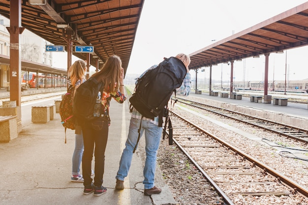 Tourists looking if train arrives