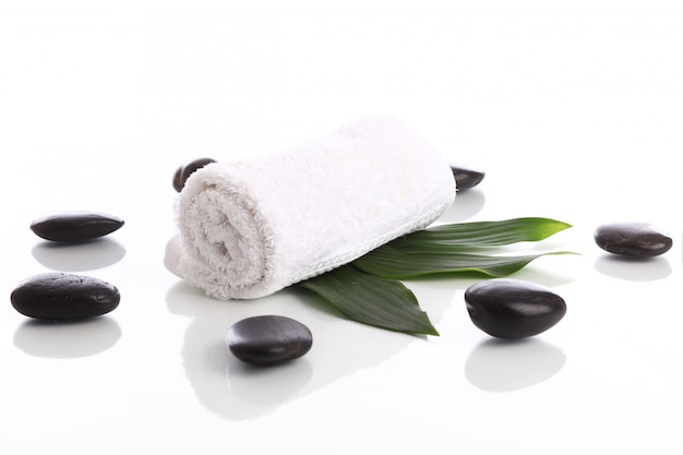 Free Photo towel and stones for massage