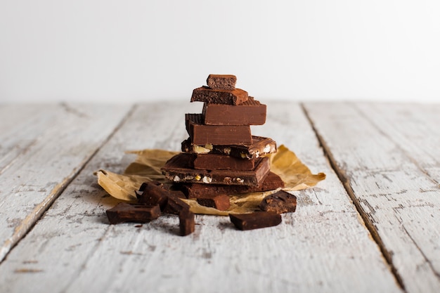 Free Photo tower of chocolate sweets on paper bag