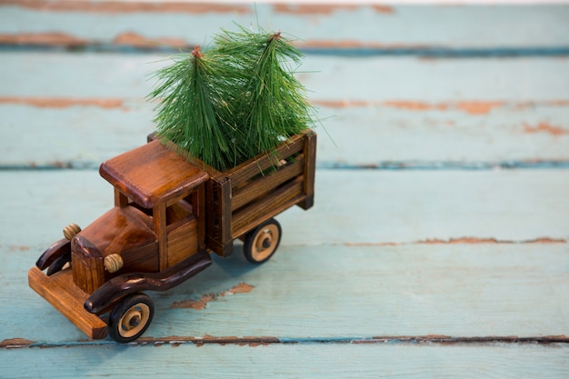 Free photo toy truck with christmas trees