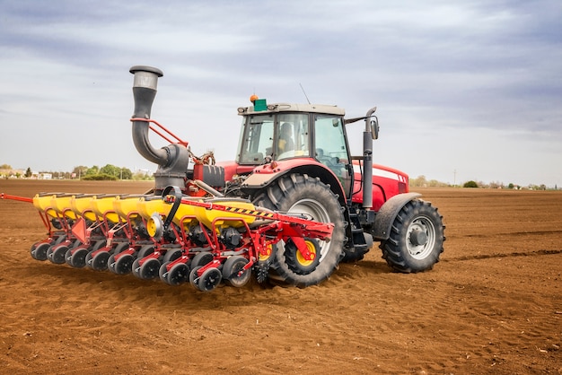 Free photo tractor working in the field