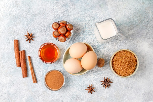 Free Photo traditional autumn baking ingredients: apples,cinnamon,nuts.