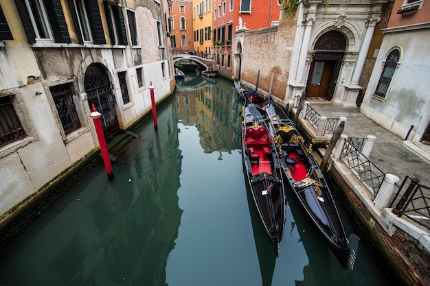 Free Photo traditional canal street with gondola in venice city, italy