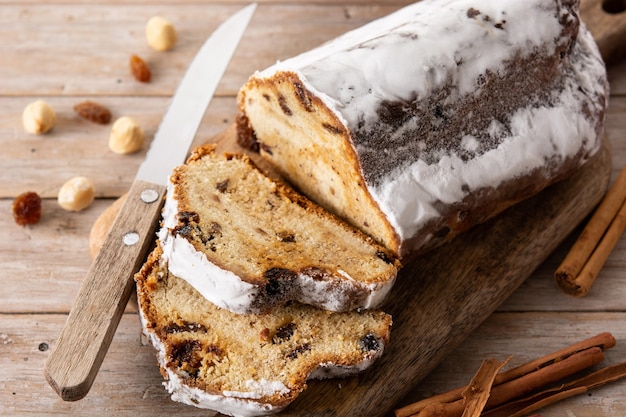 Free photo traditional german christmas stollen on wooden table