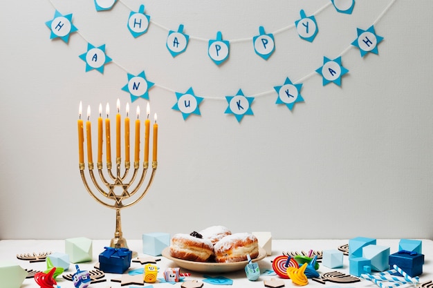 Free photo traditional jewish candleholder on a table