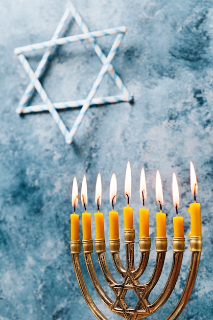 Free photo traditional jewish candlelights burning