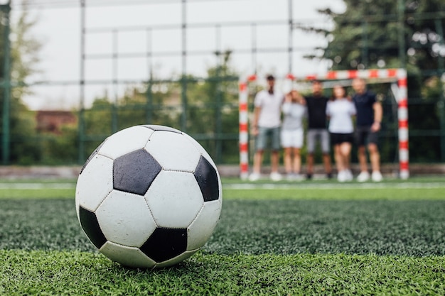 Free photo traditional soccer ball on soccer field