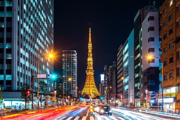 Traffic and Tokyo cityscape at night, Japan.