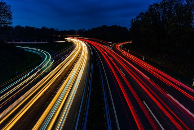 Free photo traffic with long exposure light trails of cars