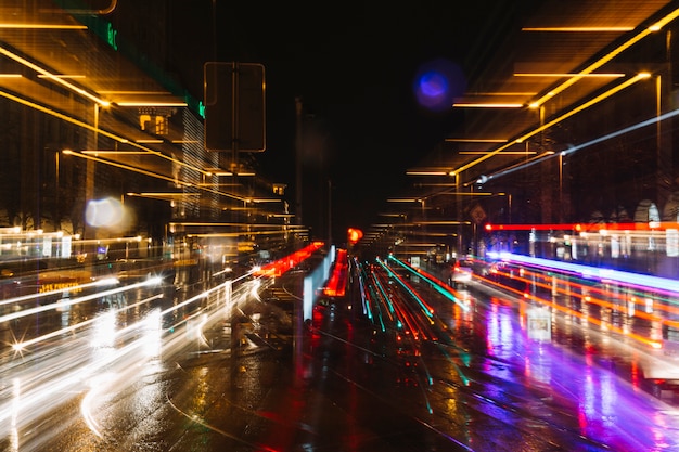 Trails of car lights on street