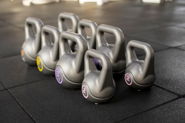 Training at gym concept with kettlebells