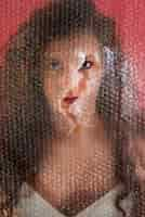 Free photo translucent and blurred portrait of woman