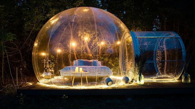 Free Photo transparent bubble tent at glamping at night