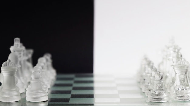 Transparent chess pieces on board