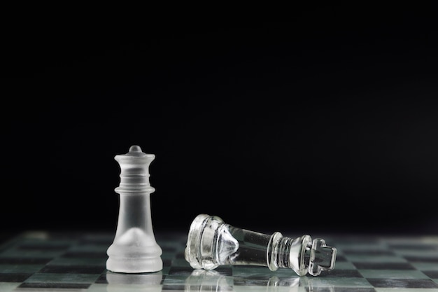 Transparent chess pieces on board