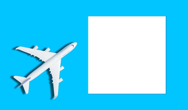 Free photo travel background concept. objective with plane on empty white paper for text. picture for add text message. backdrop for design art work.