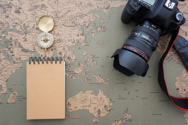 Free Photo travel composition with compass, camera and notebook