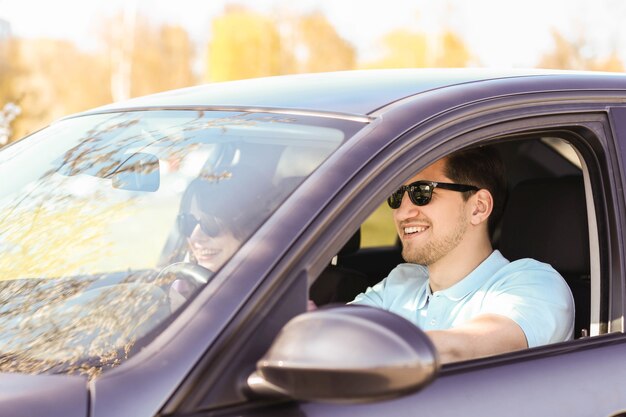 Travel. Couple is traveling in the car