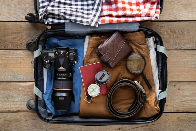 Free photo travel suitcase and preparations packing