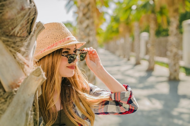 Free photo traveler posing with sun glasses