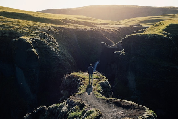 Traveller explore rugged landscape of iceland