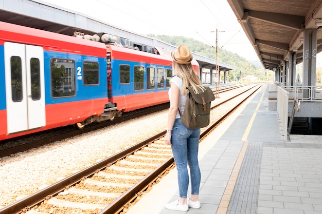 Traveller woman in a train station