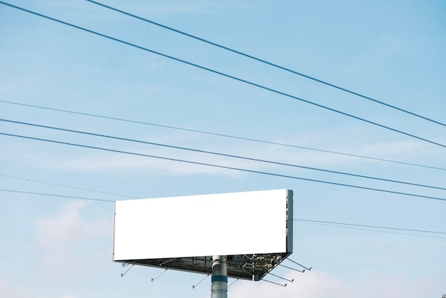 Free photo triangle billboard under wires