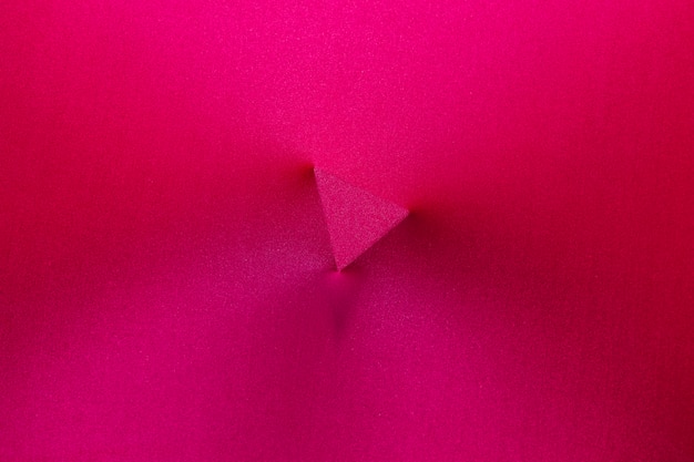 Triangle imprint in middle of magenta fabric