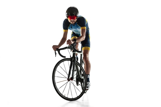 Triathlon male athlete cycle training isolated on white