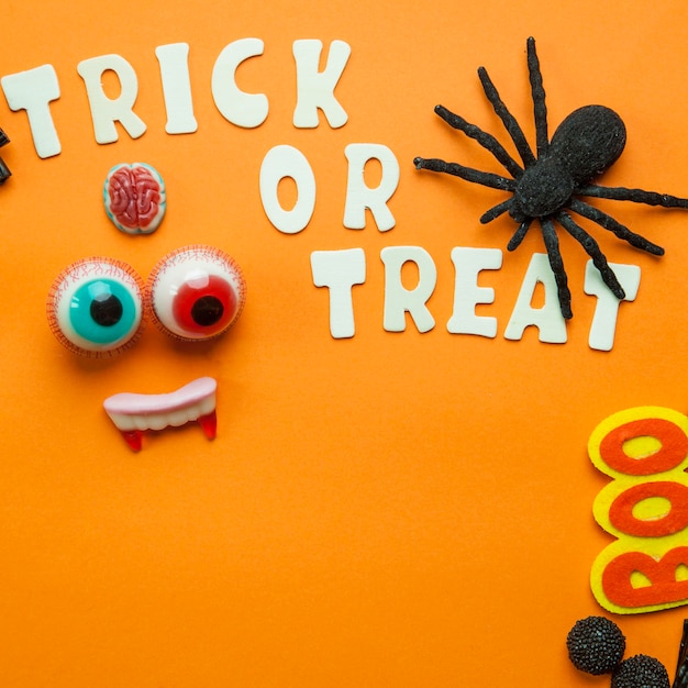 Free Photo trick or treat writing with spider