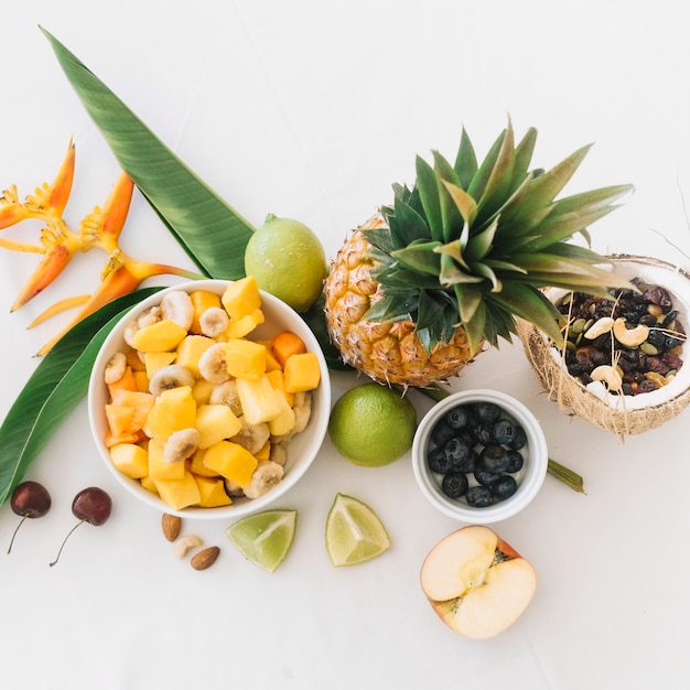 Tropical fresh fruits on white background