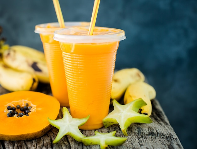 Free photo tropical smoothie with papaya and banana