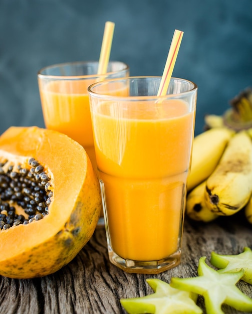 Free photo tropical smoothie with papaya and banana