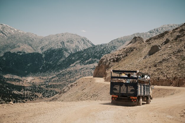 Truck driving on mountain road